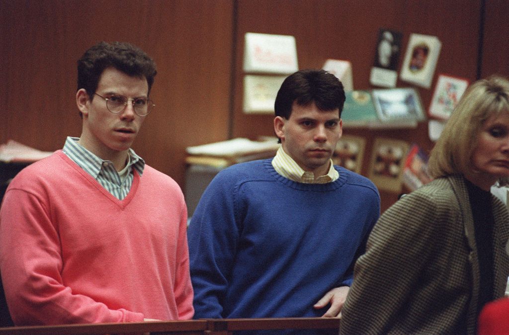 Erik Menendez (L) and his brother Lyle (R) listen during a pre-trial hearing, on December 29, 1992 in Los Angeles after the two pleaded innocent in the August 1989 shotgun deaths of their wealthy parents, Jose and Mary Louise Menendez of Beverly Hills, Calif