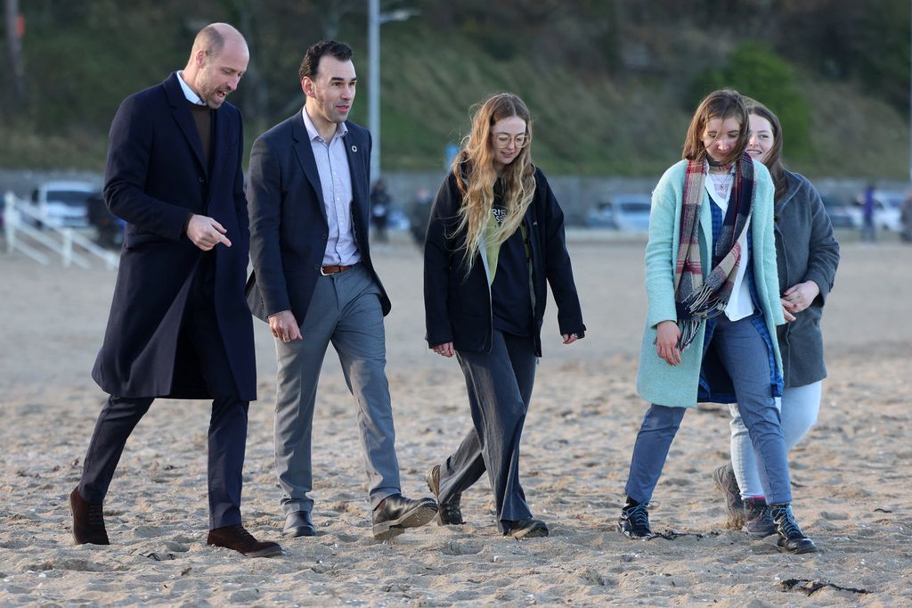Prince William, joins members of the Marine Conservation Society's Youth Ocean Network for a walk on the beach at Colwyn Bay, north Wales