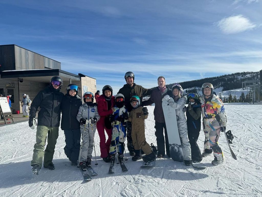 Elsa, Chris and their family celebrated the New Year with friends in the snow