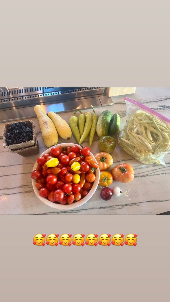 carrie underwood home grown fruits and vegetables on kitchen counter