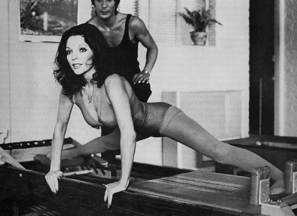 Joan Collins stetching in Pilates in 1976