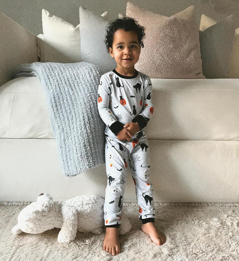 khloe kardashian son tatum wearing halloween-themed pajamas