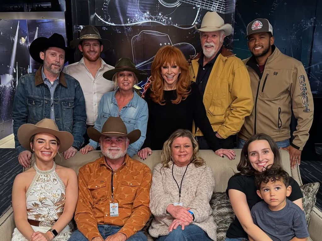 Brandon Blackstock (top left) poses with family including Reba McEntire (C)