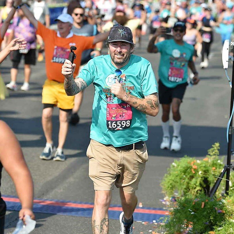 Adam the Woo running a race at Disney