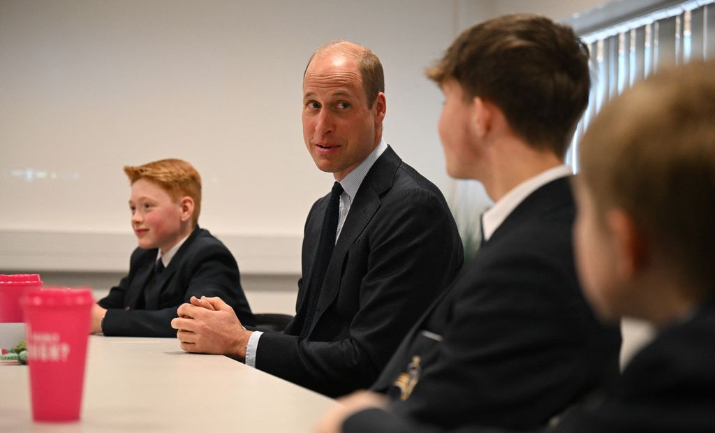 Prince William talking to pupils in Birmingham school