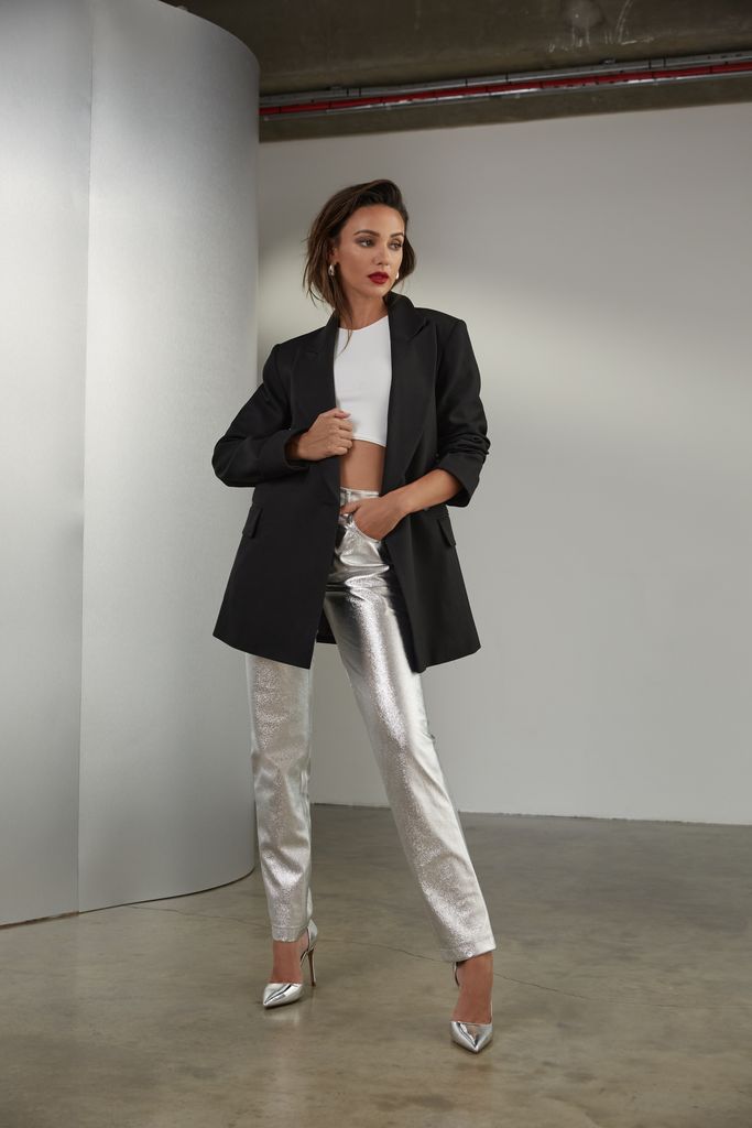 Michelle Keegan in silver trousers, white tee and black blazer