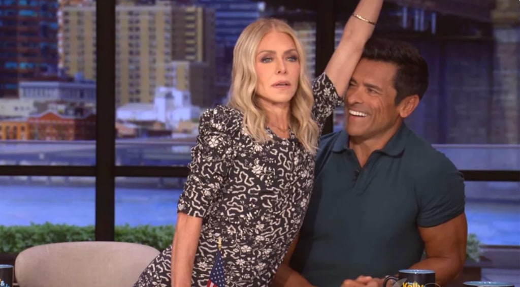 Kelly Ripa puts armpit in Mark's face