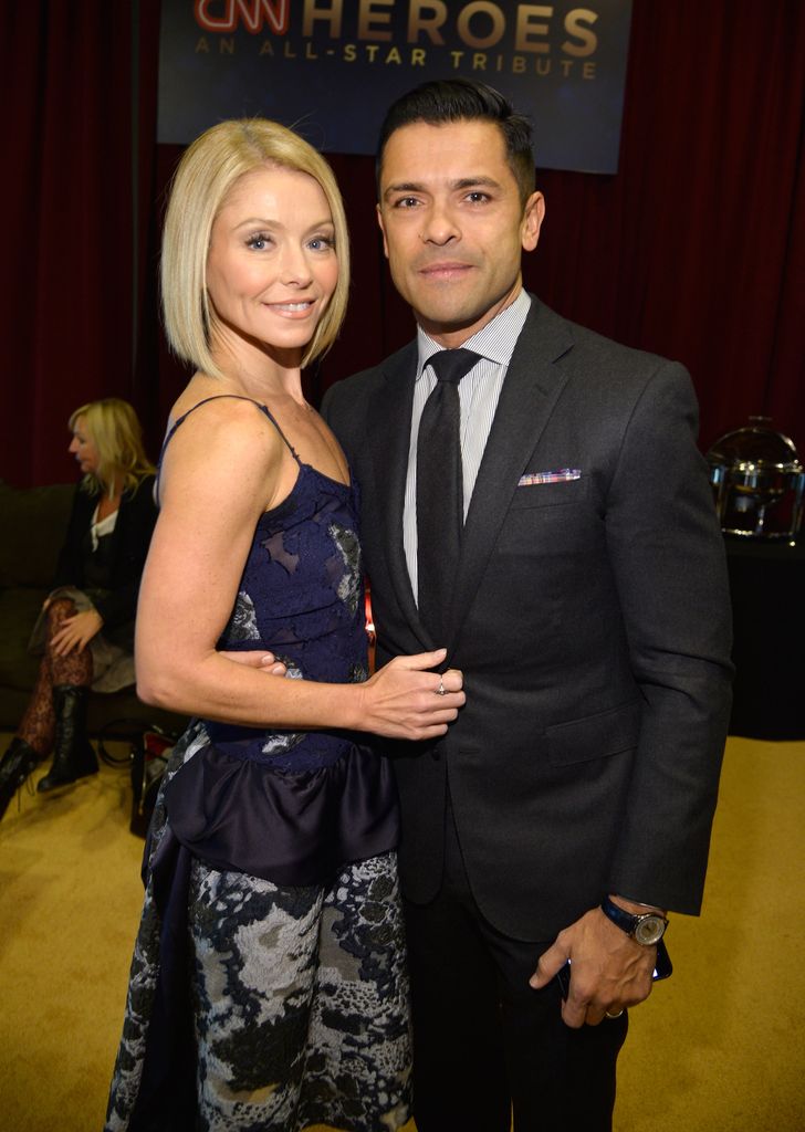 Kelly Ripa and Mark Consuelos backstage during the 2014 CNN Heroes: An All Star Tribute at American Museum of Natural History on November 18, 2014 in New York City