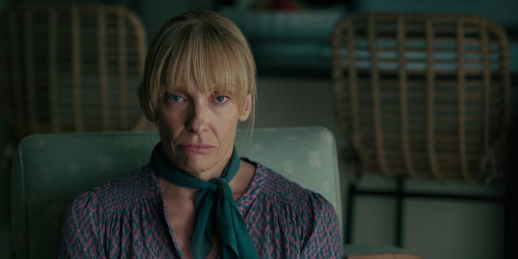 close-up of woman sitting in chair