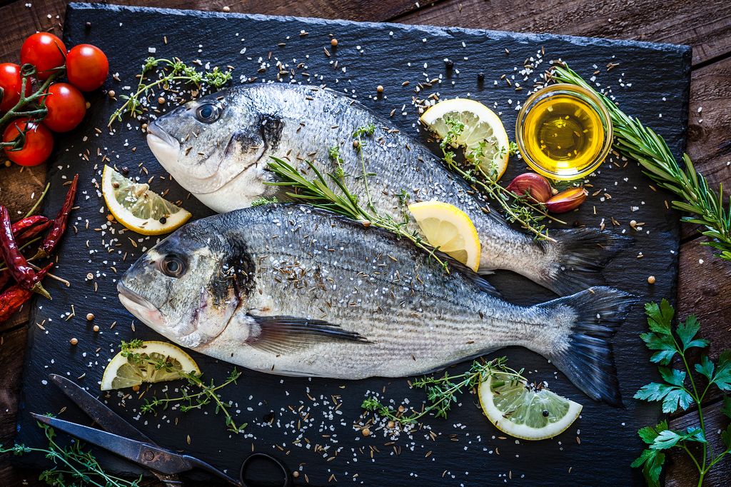 two fish on slate