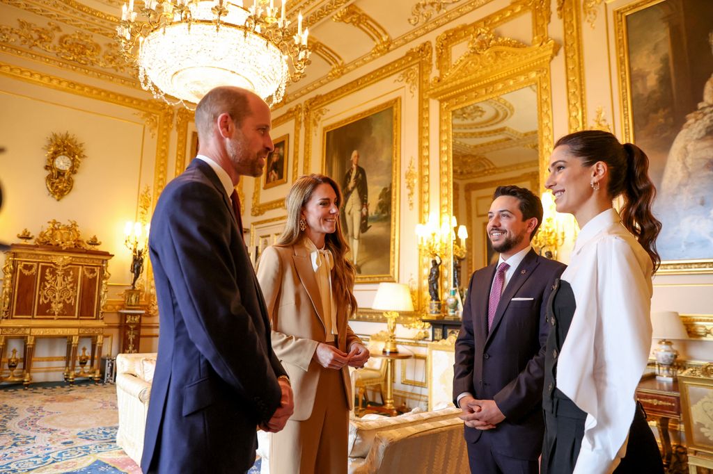 Rajwa and hussein in room at windsor castle with William and Kate 