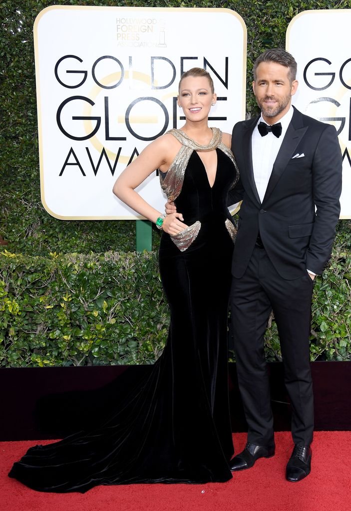 Blake Lively and Ryan Reynolds on red carpet in black