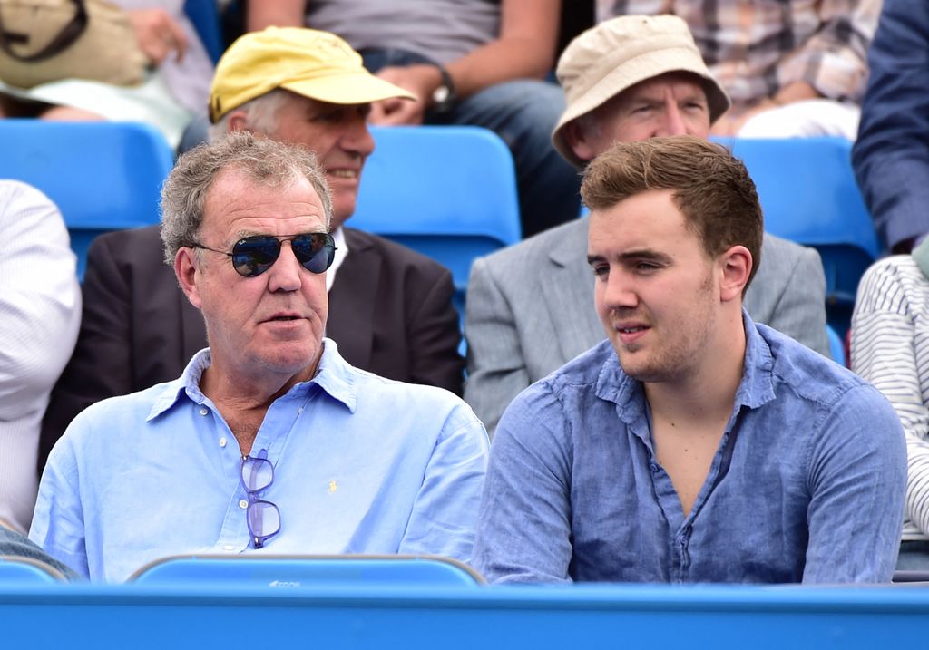 Jeremy Clarkson and son Finlo in blue shirts watching tennis