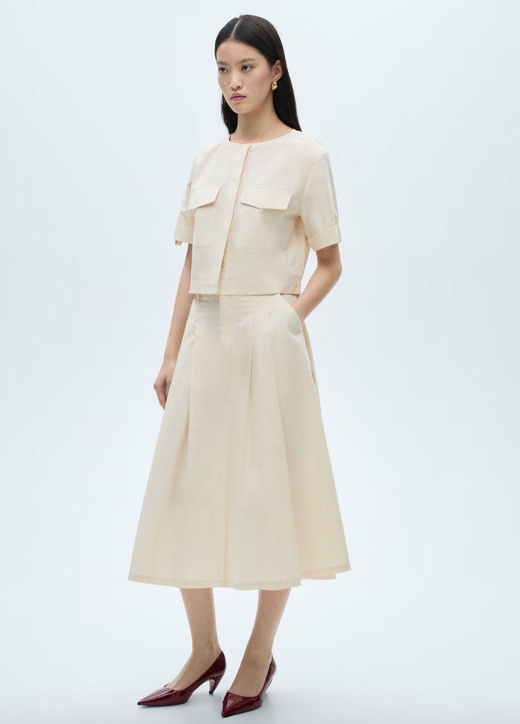 This cream pleated skirt from Mango is a more affordable alternative