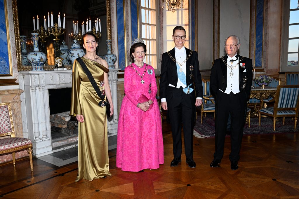 Finland's first lady Suzanne Innes-Stubb, Queen Silvia Finland's President Alexander Stubb and Sweden's King Carl Gustaf pose for a photo at the royal couple's gala dinner for the Finnish presidential couple at the Stockholm Palac