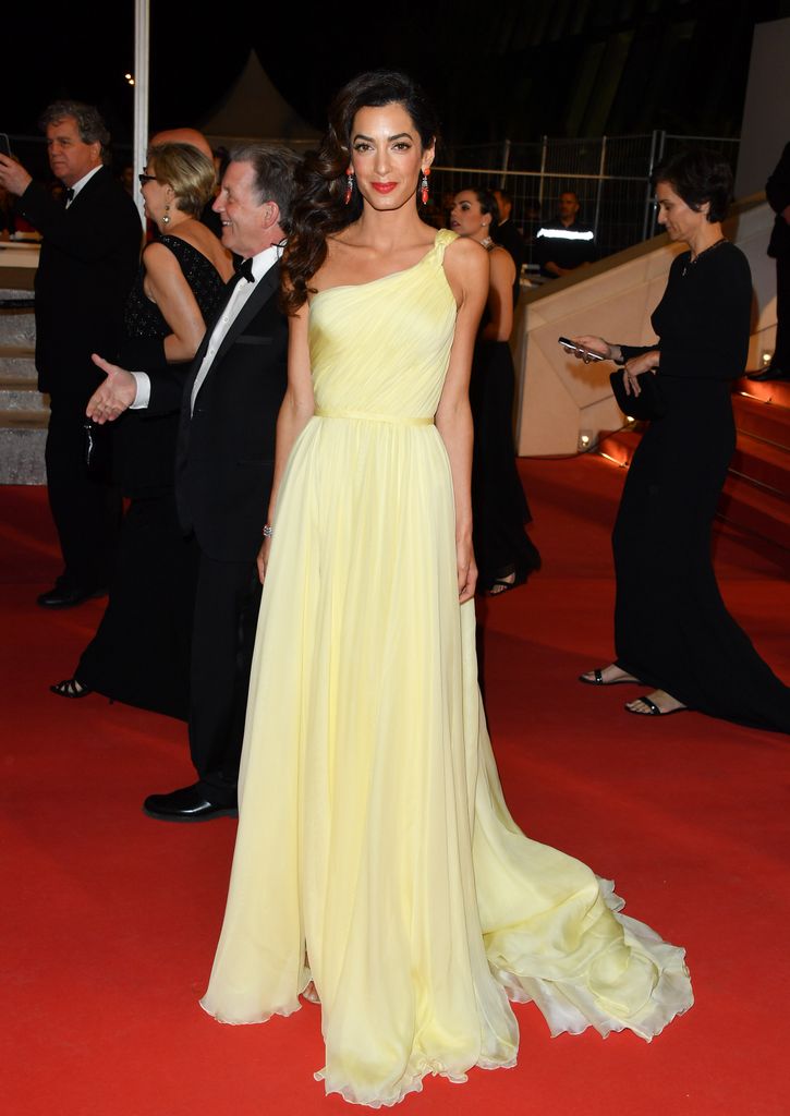 Amal Clooney departs from the screening of "Money Monster" at the annual 69th Cannes Film Festival at Palais des Festivals on May 12, 2016 in Cannes, France.  (Photo by George Pimentel/WireImage)