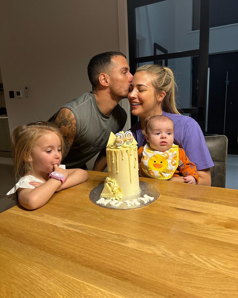 Gemma Atkinson and Gorka Marquez with their kids and a birthday cake