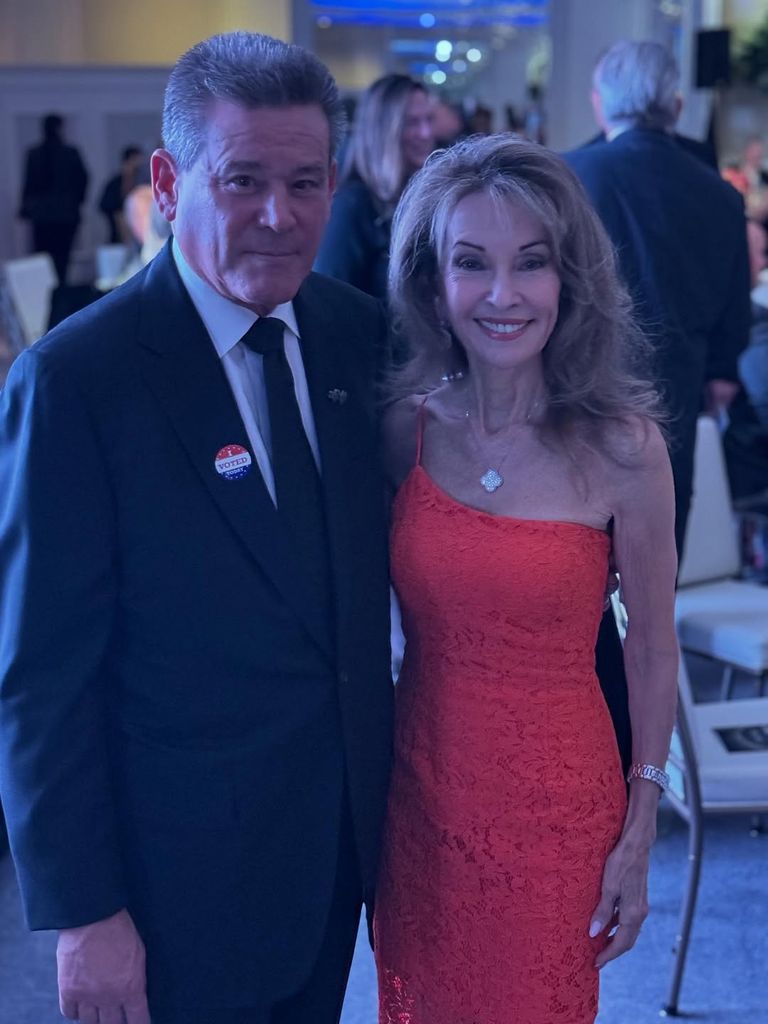 Susan Lucci looked stunning in a red lace dress as she posed alongside the doctor who saved her life 