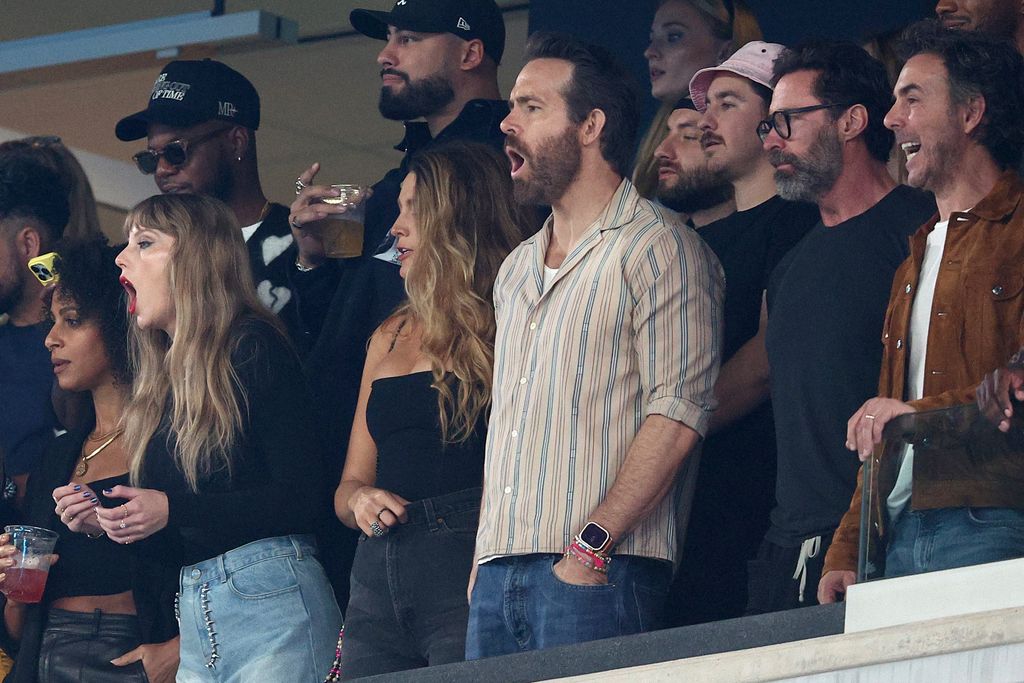  Ryan Reynolds and  Hugh Jackman cheer prior to the game between the Kansas City Chiefs and the New York Jets 