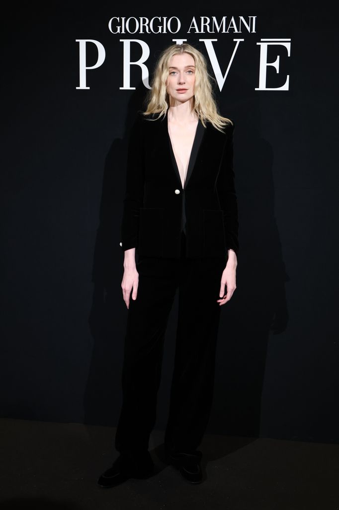 Elizabeth Debicki in black suit at the Giorgio Armani Privé Haute Couture Show