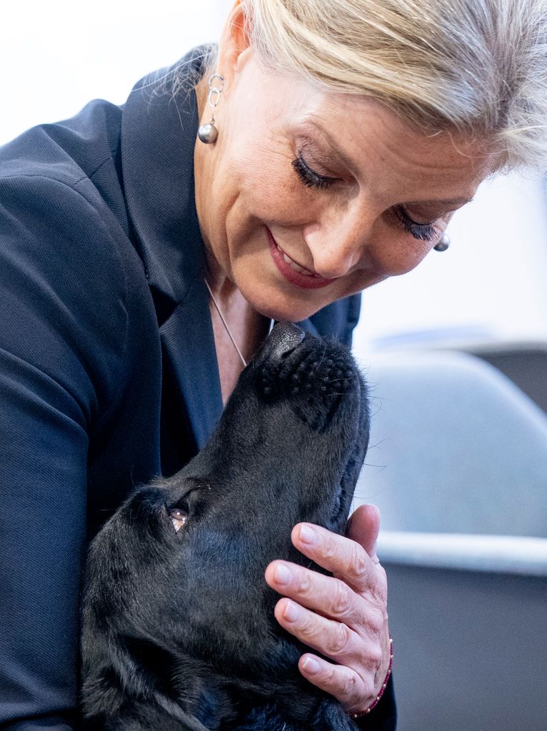 Duchess Sophie stroking a dog