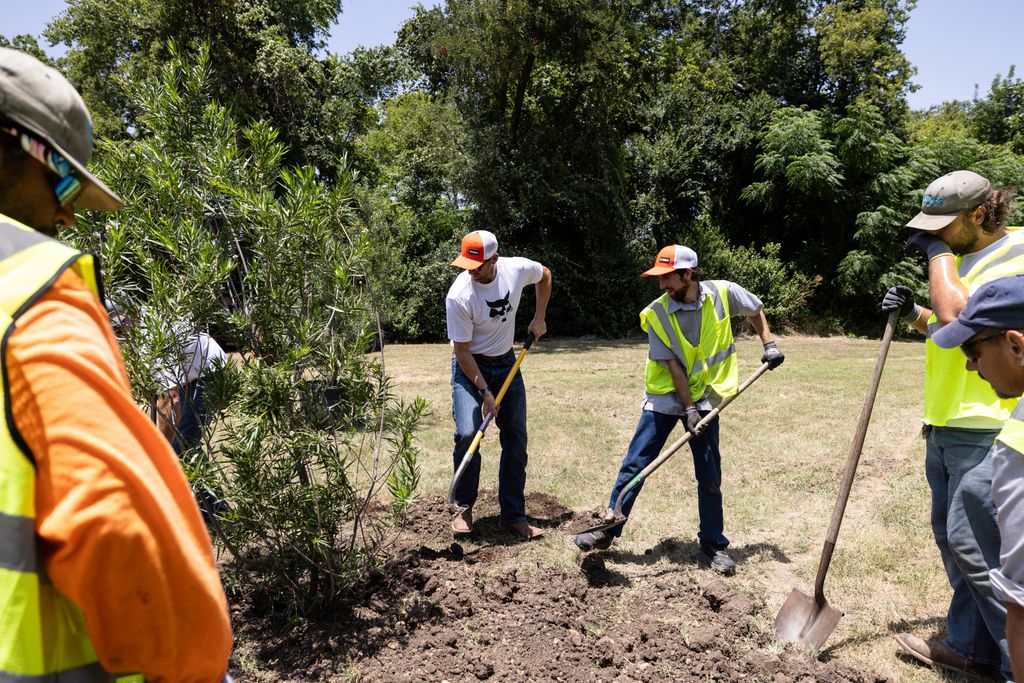 Chip Gaines and Bobcat help to rebuild the Bell's Hill Park in Waco, Texas, on Tuesday, July 16, 2024. 