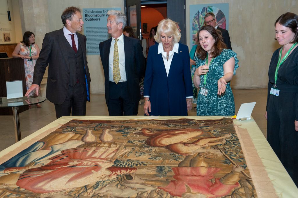 Camilla looks at a 17th tapestry during a visit to the Gardening Bohemia exhibition