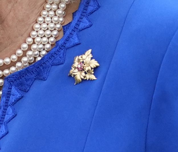 A close up of a Tiffany and Co brooch gifted to Queen Camilla from the First Lady
