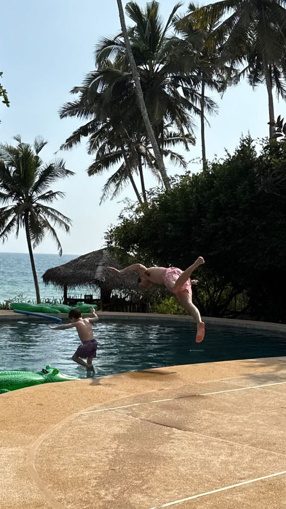 Jack Brooksbank diving into the swimming pool with August Brooksbank
