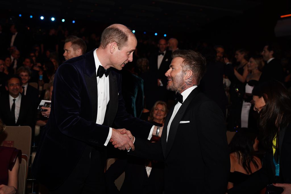 Prince William speaks with David Beckham during the Bafta Film Awards 2024