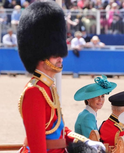 Princess Kate look at her husband, Prince William, during the Trooping the Colour ceremony