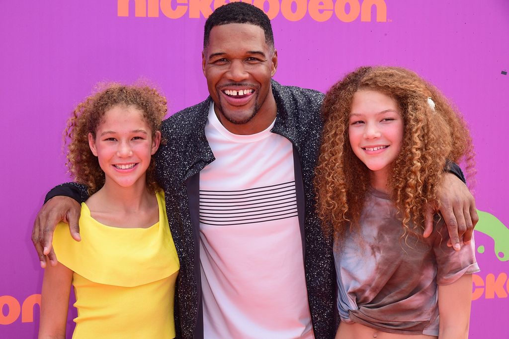 TV personality Michael Strahan (C) with Sophia Strahan (L) and Isabella Strahan (R) attend Nickelodeon Kids' Choice Sports Awards 2017 at Pauley Pavilion on July 13, 2017 in Los Angeles, California