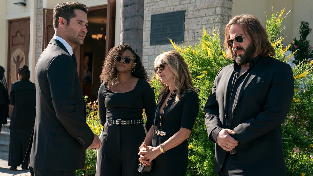Manuel Garcia-Rulfo, Jazz Raycole, Becki Newton and Angus Sampson in a funeral scene in The Lincoln Lawyer  