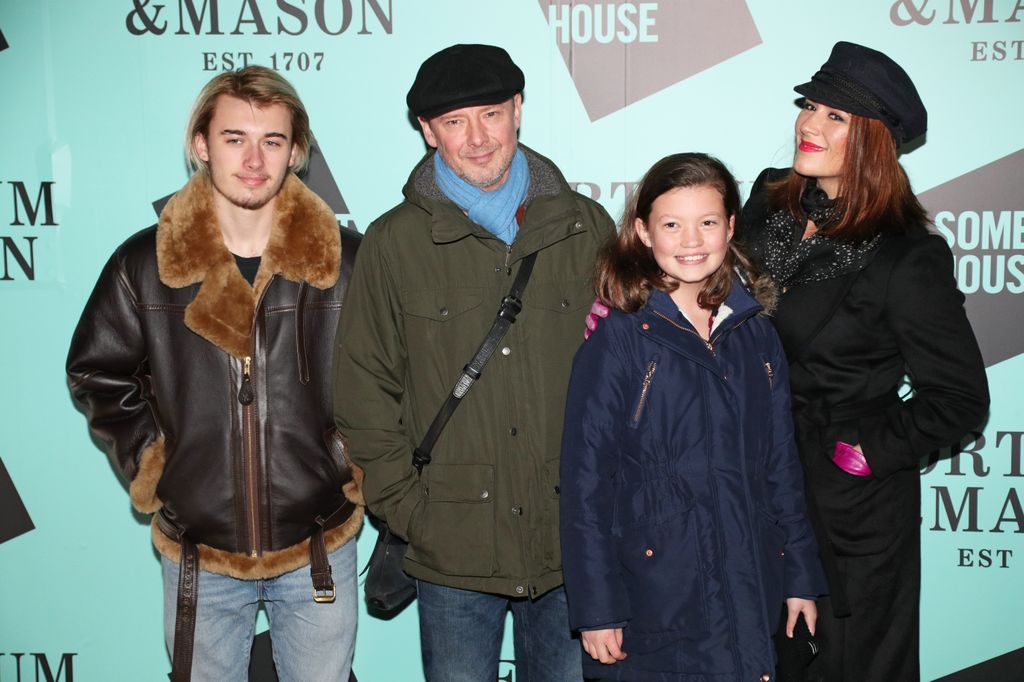 John Simm (second left) with his son Ryan Simm (left), daughter Molly Simm (second from right) and wife Kate Magowan, arriving at the launch of Skate at Somerset House with Fortnum & Mason, at Somerset House, London