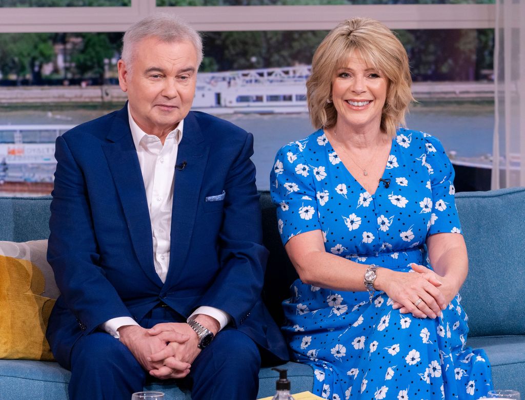 Eamonn Holmes looking glum while sat with a smiling Ruth Langsford