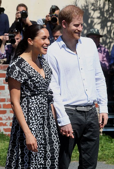 meghan and harry watch performers