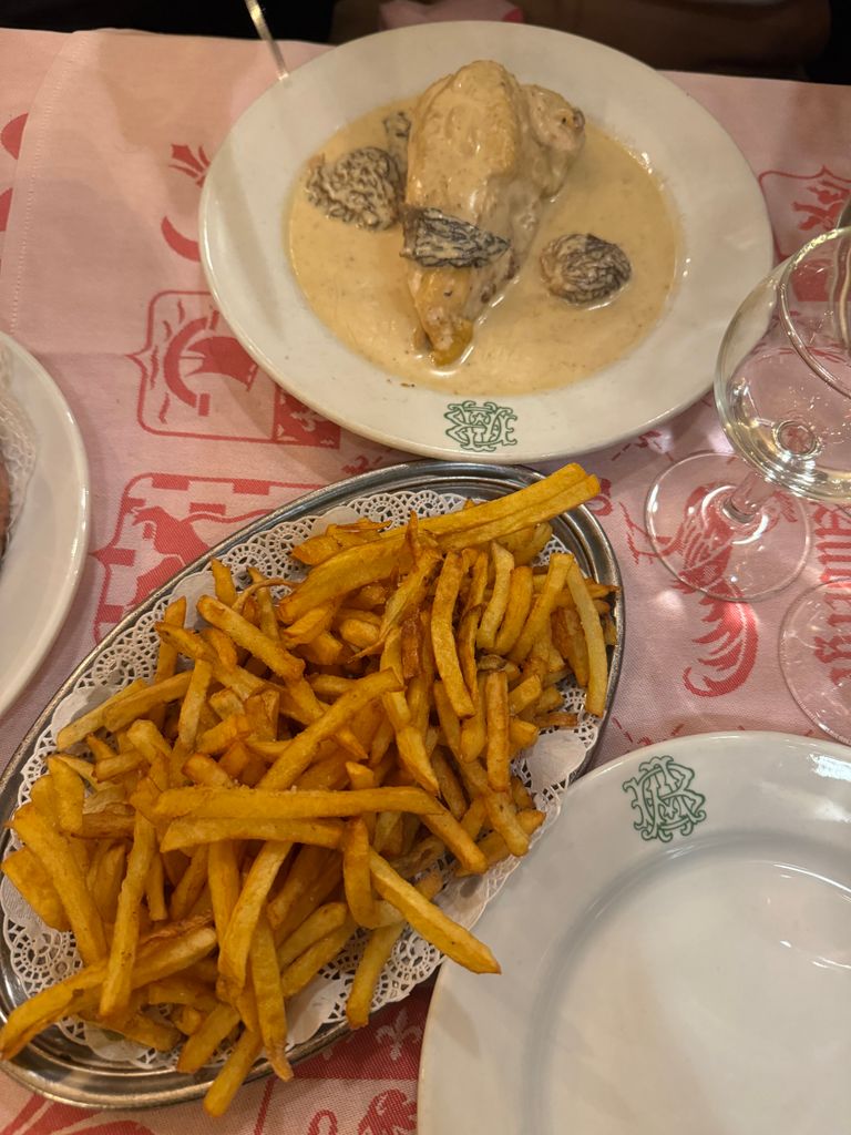 Chicken with morels and fries at Auberge Bressane in Paris