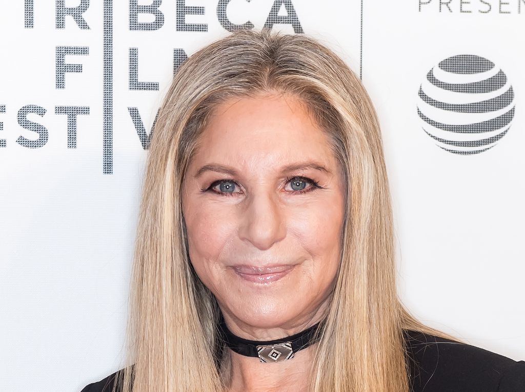 Barbara Streisand in black suit 