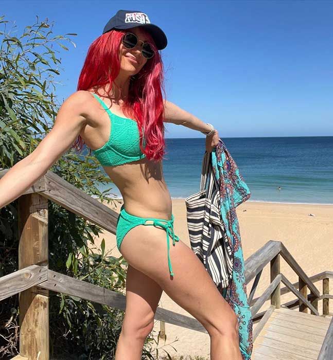 Dianne posing in her green bikini