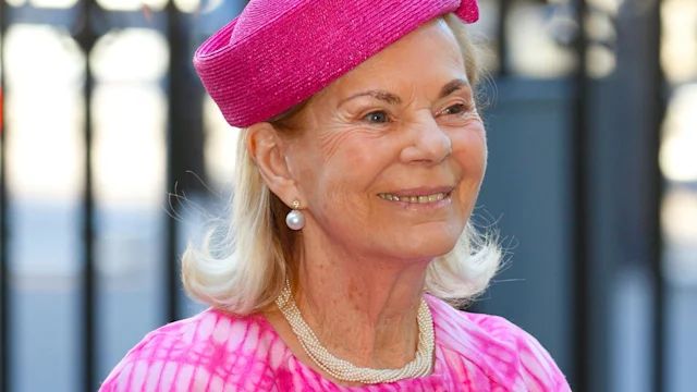 Smiling Duchess of Kent wearing pink hat and outfit