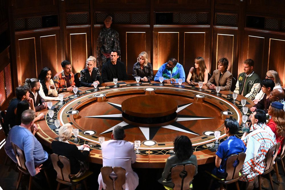 The group sit during a banishment ceremony on The Traitors season 4