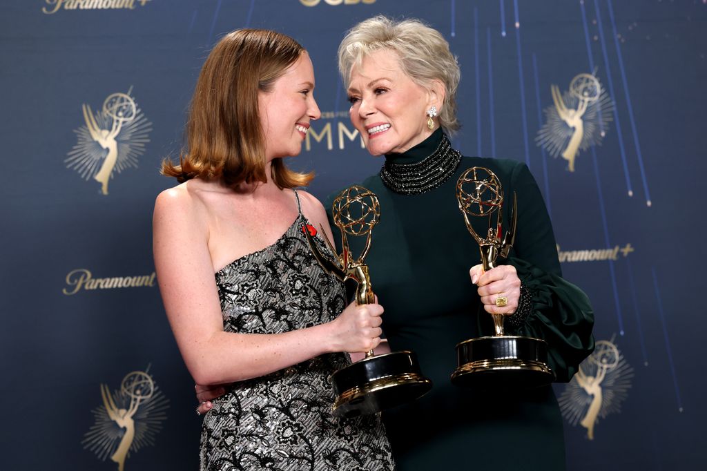 Hannah Einbinder and Jean Smart, winners of Outstanding Supporting Actress in a Comedy Series and Lead Actress in a Comedy Series for "Hacks,"  poses in the press room during the 77th Primetime Emmy Awards at Peacock Theater on September 14, 2025 in Los Angeles, California. 