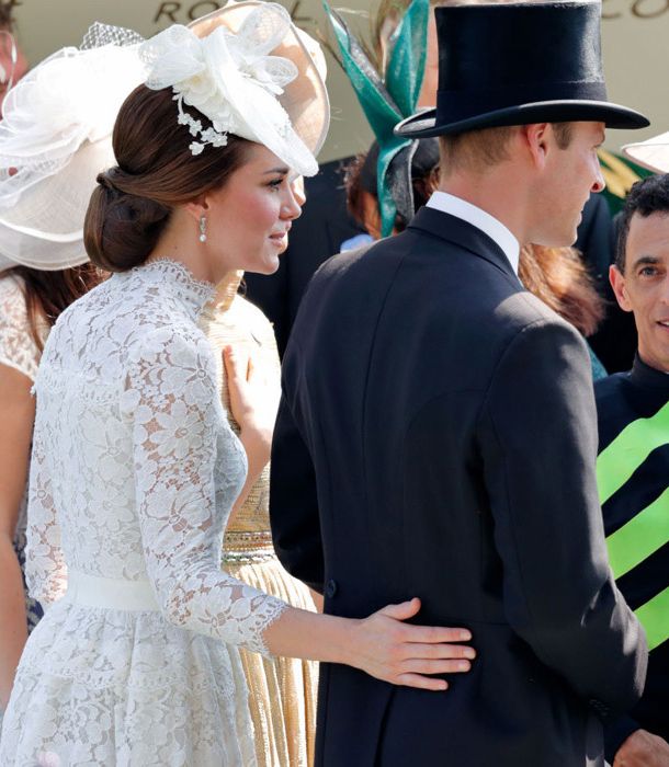 kate middleton places hand on prince william back
