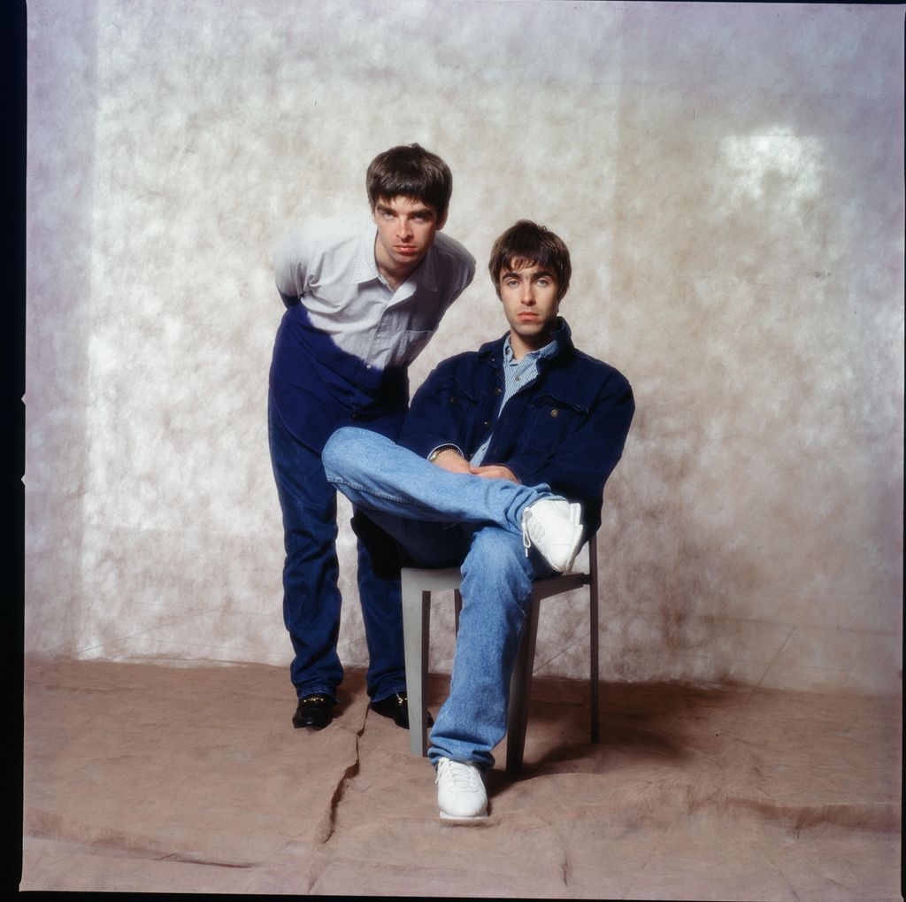 Noel Gallagher and Liam Gallagher at a photoshoot in a hotel in Tokyo, September 1994