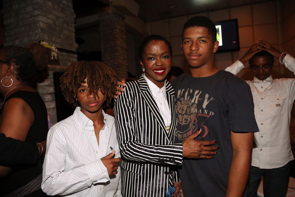 Lauryn Hill celebrates her birthday with her sons John Marley (L) and Zion Marley (r) at The Ballroom on May 26, 2015, in West Orange, New Jersey