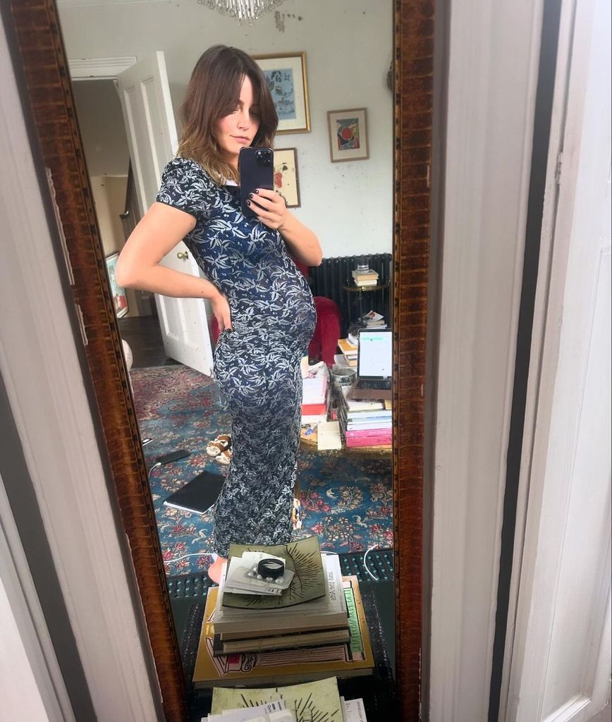 Jenna Coleman takes a selfie showing her baby bump