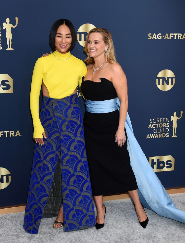 Greta Lee and Reese Witherspoon at the 28th Screen Actors Guild Awards held at Barker Hangar on February 27th, 2022 in Santa Monica, California