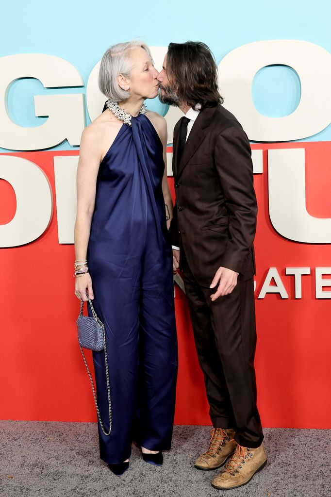 photo of keanu reeves kissing girlfriend alexandra grant on red carpet