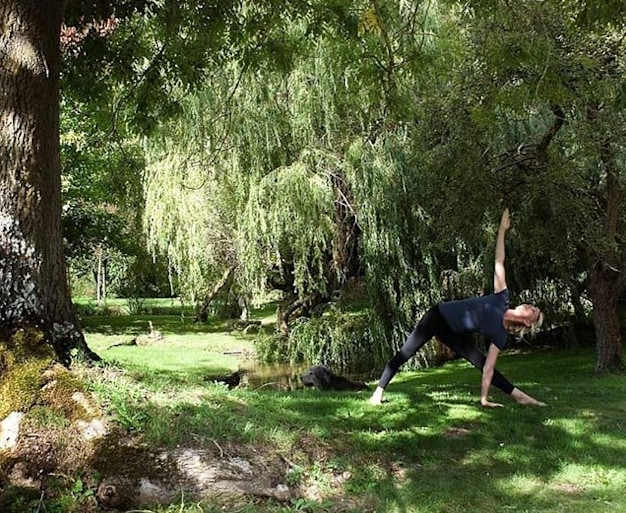 Trudie Styler practices yoga in her garden