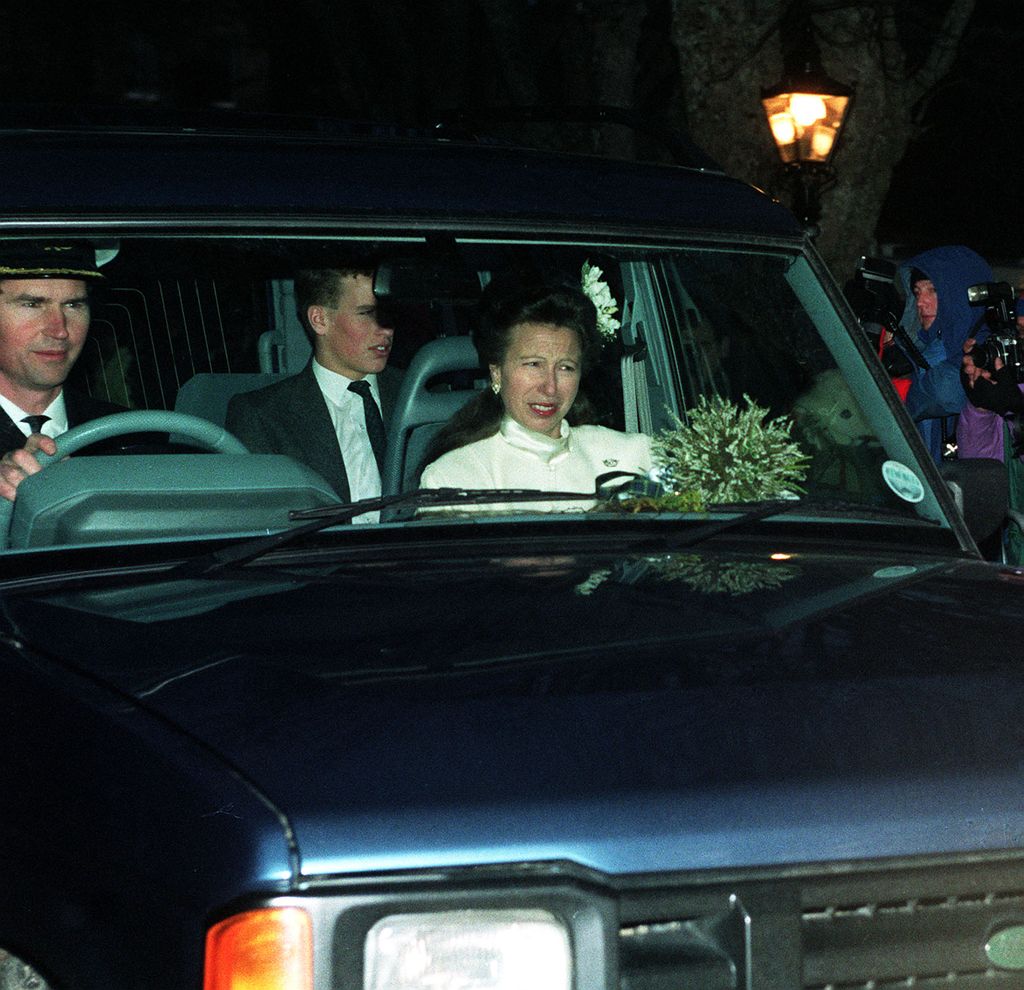 Commander Tim Laurence and the Princess Royal, with her son Peter Phillips, leave after their wedding at Craithie Church near Balmoral